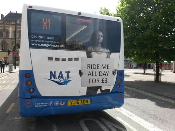 The controversial advert on the back of a X1 service operated by New Adventure Travel (NAT), based in Cardiff, promoting its fares with a picture of a half-naked woman and the words "ride me all day for £3". After a backlash a spokesman for the NAT Group promised the images would be removed from its buses within the next 24 hours. (PA Wire)