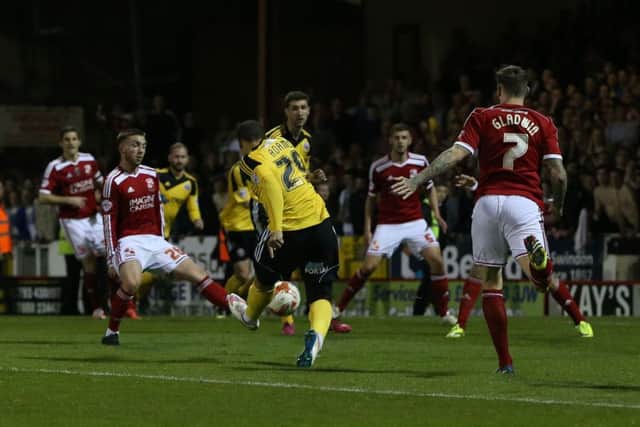 Che Adams scores to make it 5-5 but, even with seven minutes of stoppage time, Sheffield United could not draw level on aggregate with Swindon (Picture: Martyn Harrison).