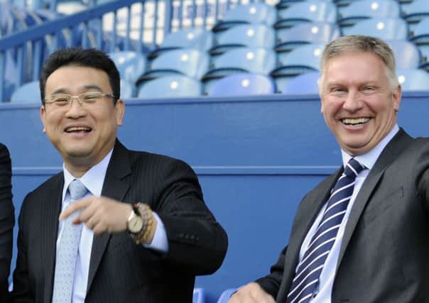 No laughing matter: A split between Dejphon Chansiri and  Adam Pearson.