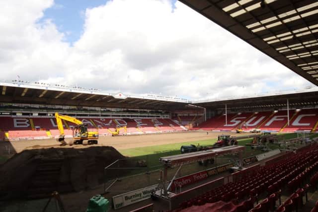 Work began yesterday on laying a new pitch at Bramall Lane in time for Sheffield United to begin another season in League One (Picture: Martyn Harrison).