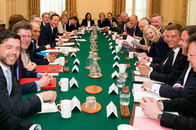 Prime Minister David Cameron hosts the first cabinet meeting with his new cabinet in Downing Street in London, following his General Election victory. (PA Wire)