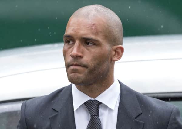 Ex-footballer Clarke Carlisle arrives for sentencing at Highbury Magistrates Court in London after he pleaded guilty to a drink-driving charge.