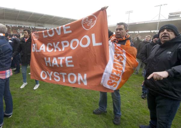 Blackpool fans stage a protest and pitch invasion against the running of the club by owner Owen Oyston.
The match was later abandoned by match referee Mick Russell

. (Picture: www.camerasport.com)