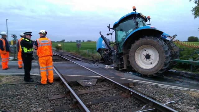 Tractor hit on a farm crossing by a train near Knaresborough.  Photo:  Ben Lack/Malik Walton.
