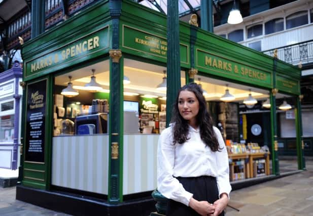 Marks & Spencer company archive perform 'Marks in Time Live: After Hours' as part of museums at night in Leeds Kirkgate Market. Malak El-Gonemy plays the part of Esther Brown, who was one of the first M&S shop girls. (
Picture: Jonathan Gawthorpe)