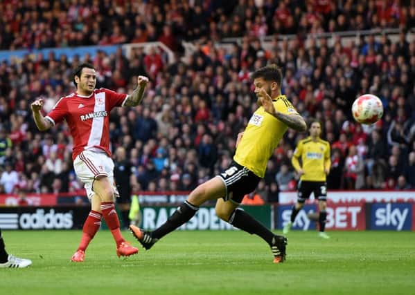 Middlesbrough's Lee Tomlin scores his team's first goal against Brentford. Picture: Martin Rickett/PA