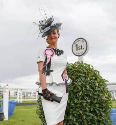 Julia Short won the Beverley heat and the overall Best Dressed Racegoer of the Year in this white and black peplum outfit.