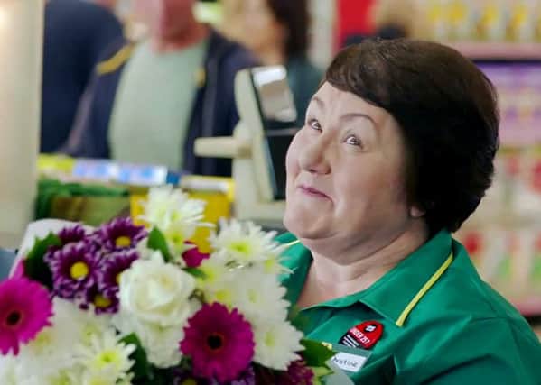 A scene from Morrisons' Express Checkout commercial