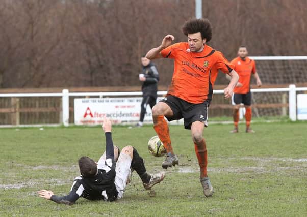 Much-travelled Jason Price is pictured turning out for Brighouse Town.