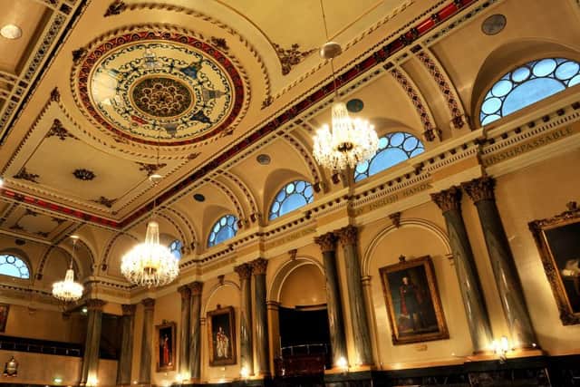 The main hall of Cutlers' Hall in Sheffield is edged with portraits of Mastler Cutlers throughout the years. The ceiling is ornate in design and must have impressed the hall's first visitors in Victorian times. Picture Mike Cowling.