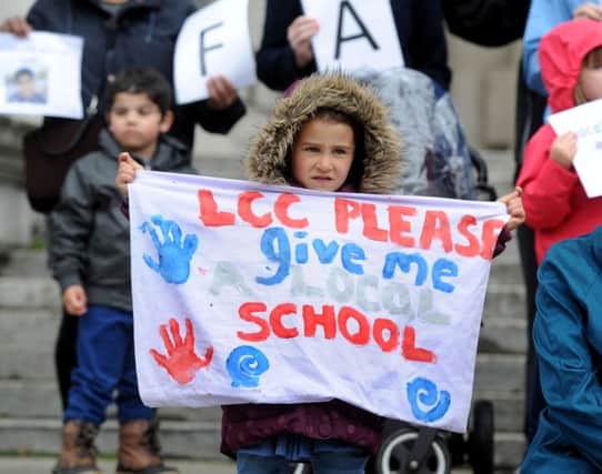 Sofia Desaraju, aged four, during protest rally over school places.