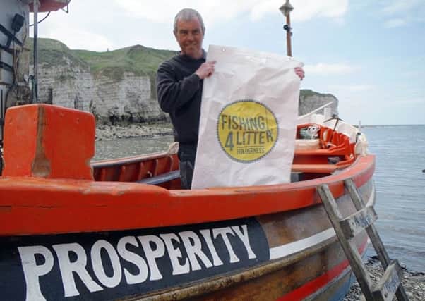 SUPPORT: Fisherman Russ Conlon, at North Landing, Flamborough,is  supporting the Fishing for Litter campaign.