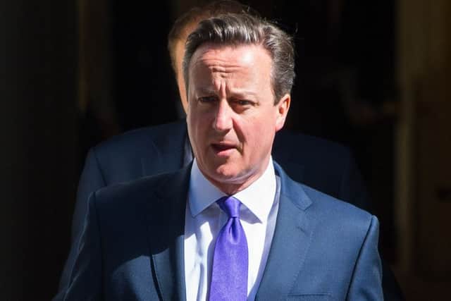 Prime Minister David Cameron leaves 10 Downing Street to attend the State Opening of Parliament.