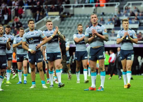 Leeds Rhinos' players thank the fans. Picture: Steve Riding.