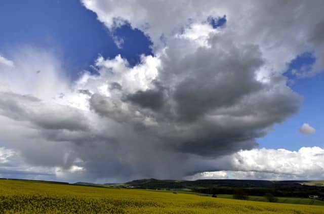 A storm passes over the North Yorkshire Moors as changeable weather continues across the UK.