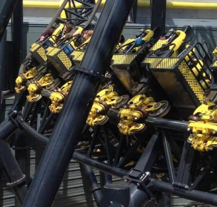Picture the Twitter feed of @_ben_jamming of Alton Towers amusement park's Smiler rollercoaster after four people were seriously injured in a collision between two carriages.