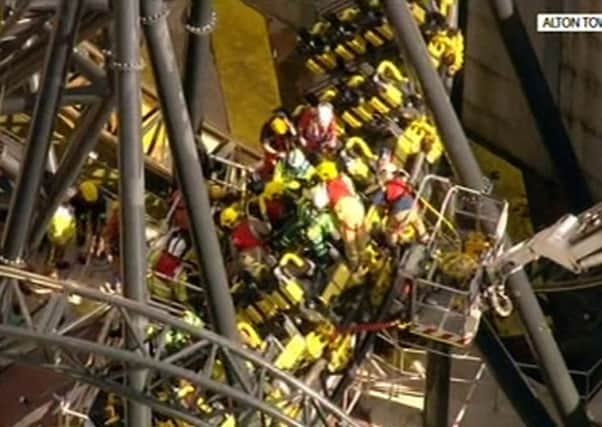 Video grab taken from Sky News of emergency services attending the scene after an Alton Towers rollercoaster carriage carrying 16 people crashed into an empty carriage.