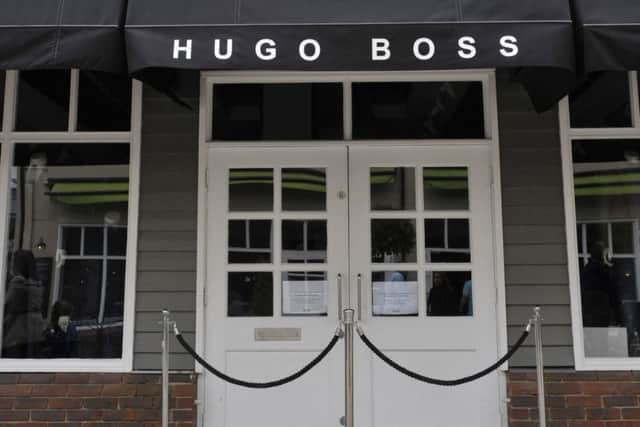 Four-year-old Austen Harrison was crushed to death when an 18-stone mirror fell on him in the changing room area of the Hugo Boss store at Bicester.
