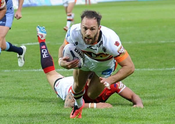 Luke Gale scores his try for Castleford at Hull KR on Friday night and, below, celebrates.