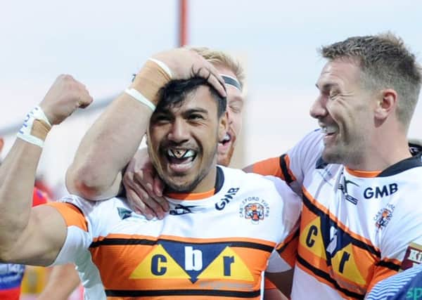 Denny Solomona celebrates his try for Castleford Tigers against Hull KR on Friday night. Picture: Steve Riding.