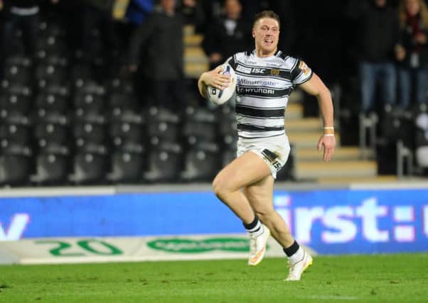 Tom Lineham runs in a try for Hull FC against Widnes (Picture: Steve Riding).