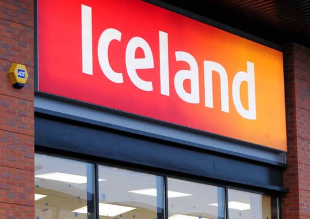 Iceland joined its rivals in warning over the impact of food deflation and price cuts as it revealed annual earnings slumped by more than a quarter after sliding sales.