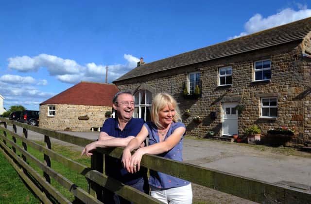 Barry and Elaine Stonard at Home Grange Farm, Galphay, near Ripon, whre they have cows and sheep aswell as running a B&B on-site.  Pic: Jonathan Gawthorpe.