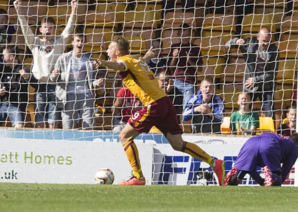 Motherwell's Lee Erwin celebrates his goal during the Scottish Premiership match at Fir Park, Motherwell.
