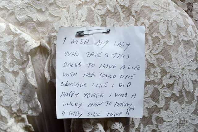 The touching note found pinned to the dress.