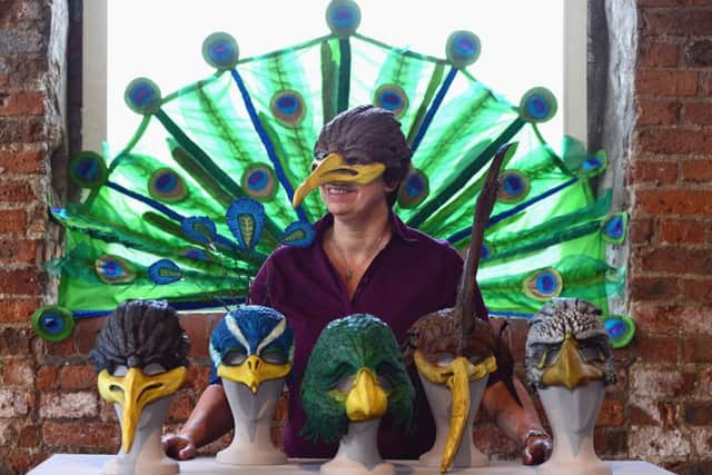 Faceless artistic director Bev Adams, pictured at The Calder with masks from Conference of the Birds.
Picture: Scott Merrylees
