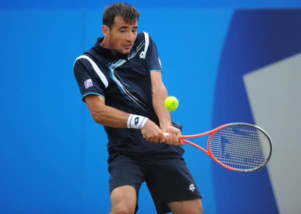 Croatia's Ivan Dodig in action against France's Jo-Wilfriend Tsonga during day four of the AEGON Championships at The Queen's Club, London. He will be one of the star attraction at Ilkley next week.