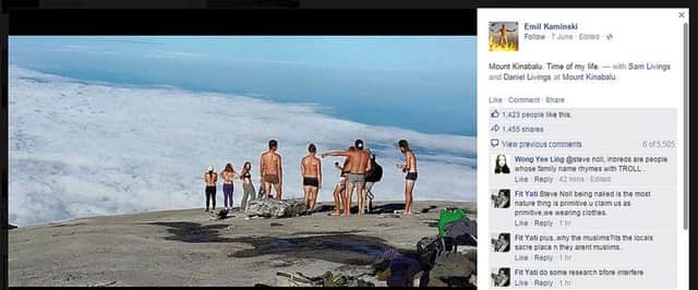 Screen grab taken from the Facebook page of Emil Kaminski showing tourists allegedly posing naked on top of Mount Kinabalu in Malaysia, as British woman Eleanor Hawkins and four other westerners were arrested for allegedly posing naked on top of the sacred mountain.