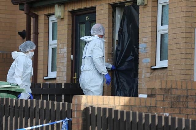 Police forensic teams at the scene this morning.  Picture: Ross Parry Agency