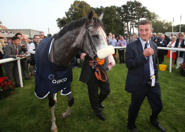 The Grey Gatsby and trainer Kevin Ryan in the parade ring after winning The QIPCO Irish Champion Stakes. Picture: Niall Carson/PA