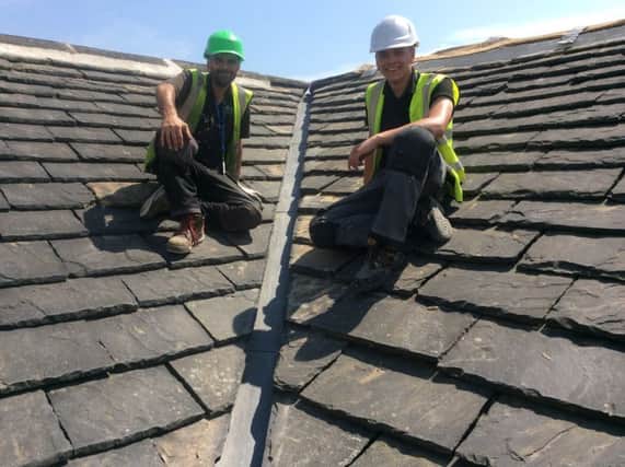 (L-R) Ploughcroft's Scott Noone, heritage roofer, and Oliver Scott, apprentice