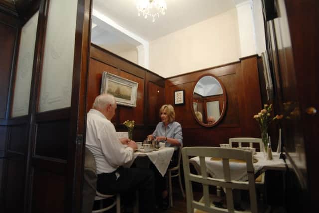 Dinning in the panelled booths at Francis Tea Rooms, Scarbrorough