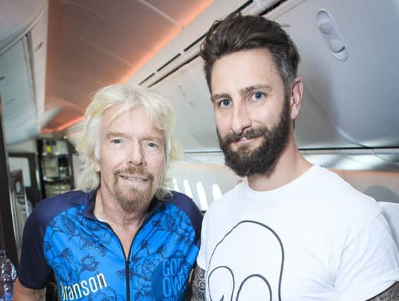 Leeds cycling apparel entrepreneur Sam Morgan (right) who won a mentoring session in the sky with Sir Richard Branson