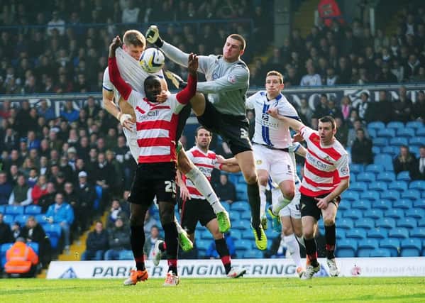 Leeds United v Doncaster Rover do battle back in March last year. Picture: Jonathan Gawthorpe