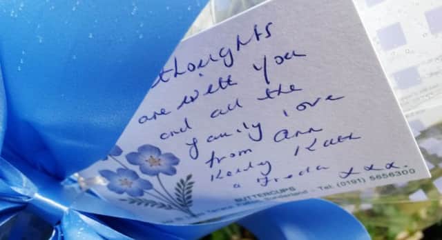Flowers are left outside a house in Falkland Road, Sunderland, where a baby has died after he was bitten by a dog. PRESS ASSOCIATION Photo. Picture date: Saturday June 20, 2015. Northumbria Police said the three-week-old boy was taken to hospital after he was bitten by a small terrier. Photo:: Dave Higgens/PA Wire