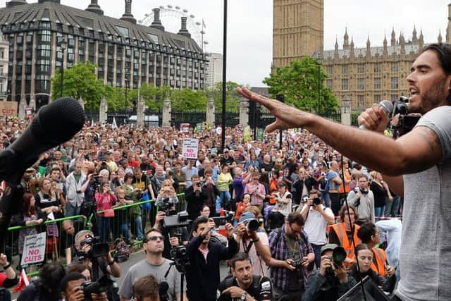 Russell Brand speaks at the End Austerity Now rally in Parliament Square, London.  Photo: John Stillwell/PA Wire