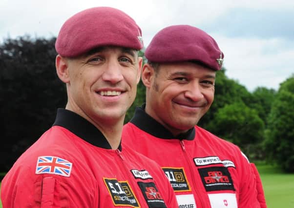 The Red Devils parachutists Cpl Mike French (left) and Cpl Wayne Shorthouse after performing a tandem flight at Toulston Polo Club Silver Jubilee Polo Tournament near Tadcaster in their first flight since their mid air accident on Friday evening. Picture: Anna Gowthorpe