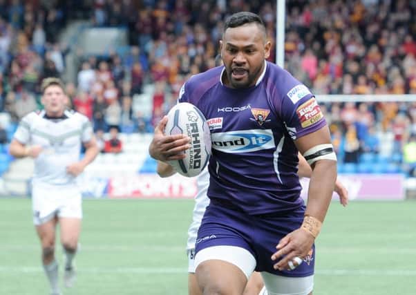 Huddersfield Giants' Ukuma Ta'ai goes over for a try against Widnes.