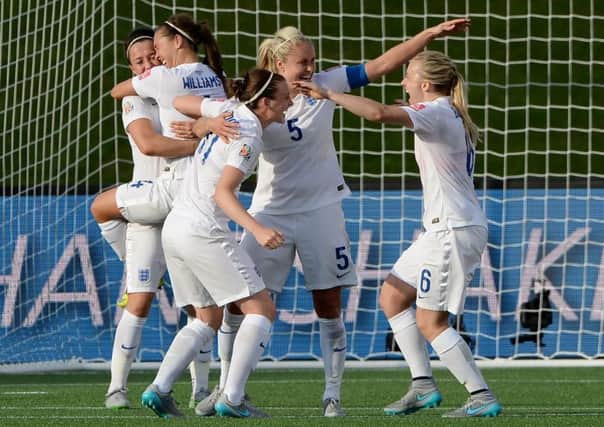 Golden girls: From left, England's Lucy Bronze,  Fara Williams, Jade Moore, Steph Houghton and Laura Bassett celebrate after defeating Norway. Picture: AP