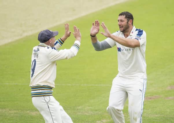 Yorkshire's Tim Bresnan is congratulated by Adam Lyth on dismissing Nottinghamshire's Michael Lumb LBW.