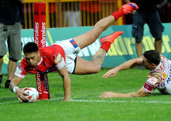Hull Kingston Rovers winger Ken Sio dives in to score his second try in last nights Challenge Cup victory against Catalans Dragons (Picture:Jonathan Gawthorpe).