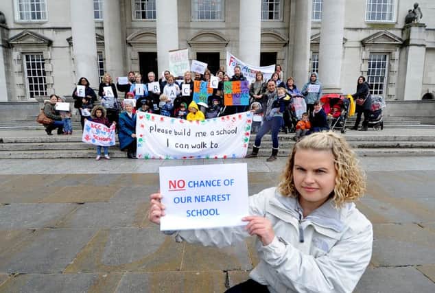 Date: 28th April 2015, Picture James Hardisty. (JH1008/62e) A group calling themselves Fair Access to Local Schools were demonstrating on the steps of Leeds Civic Hall in protest to the lack of school places in North Leeds. Pictured (foreground) Lucy Clement, spokesperson for Fair Access to Local Schools.