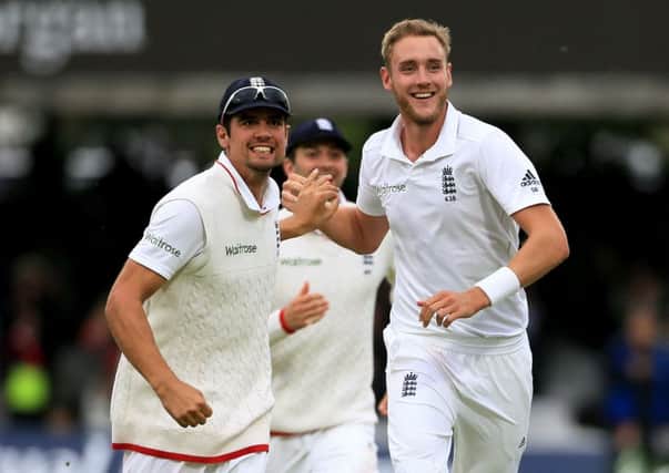 England's Stuart Broad, right, and Alastair Cook.
