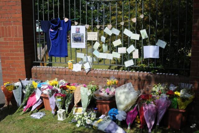 Tributes to 19-year-old Tunisia shootings victim Joel Richards outside the campus of the University of Worcester