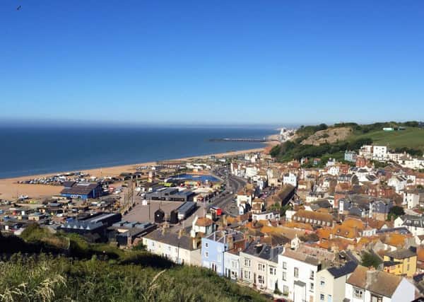 Early morning sunshine overlooking Hastings, East Sussex, as temperatures are set to soar to as high as 35C in Britain - amid fears that the heat could disrupt rail services.