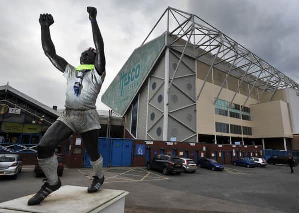 Billy Bremner statue and the East Stand, Elland Road Stadium.  2 February 2012.  Picture Bruce Rollinson
